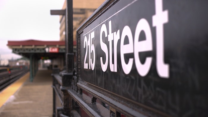 Subway sign indicating 215 Street station