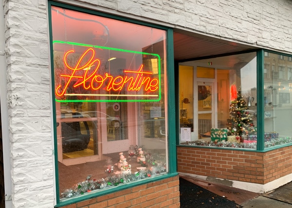 Bakery storefront with neon sign that says Florentine in the window.