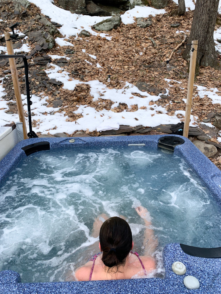 Woman in hot tub.