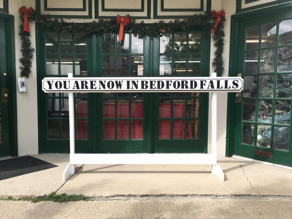 Entrance to It's a Wonderful Life Museum in Seneca Falls, NY. A sign says, "You are Now in Bedford Falls."