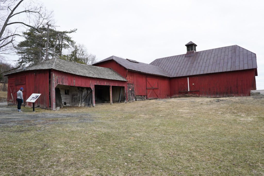 A red barn on the grounds of Olana.