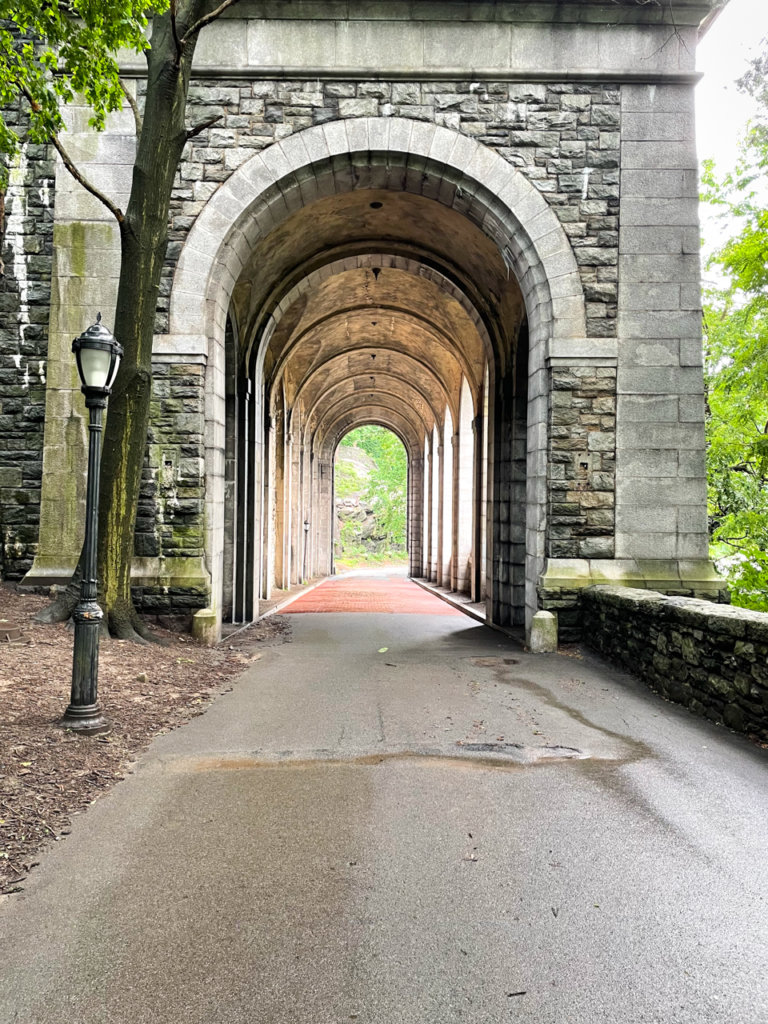 Stone arcade walkway in Fort Tryon Park.