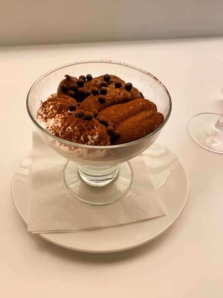 Restaurant dessert: chocolate pudding served in a clear sundae glass. 