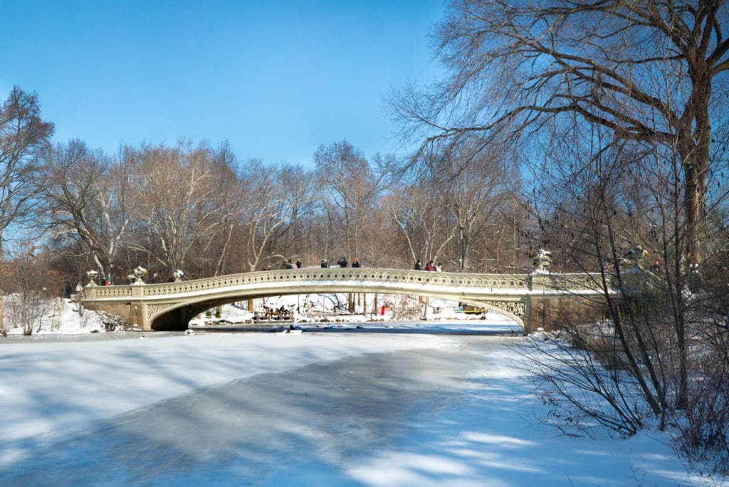 Bow Bridge in Central Park, New York City, after a snowfall.