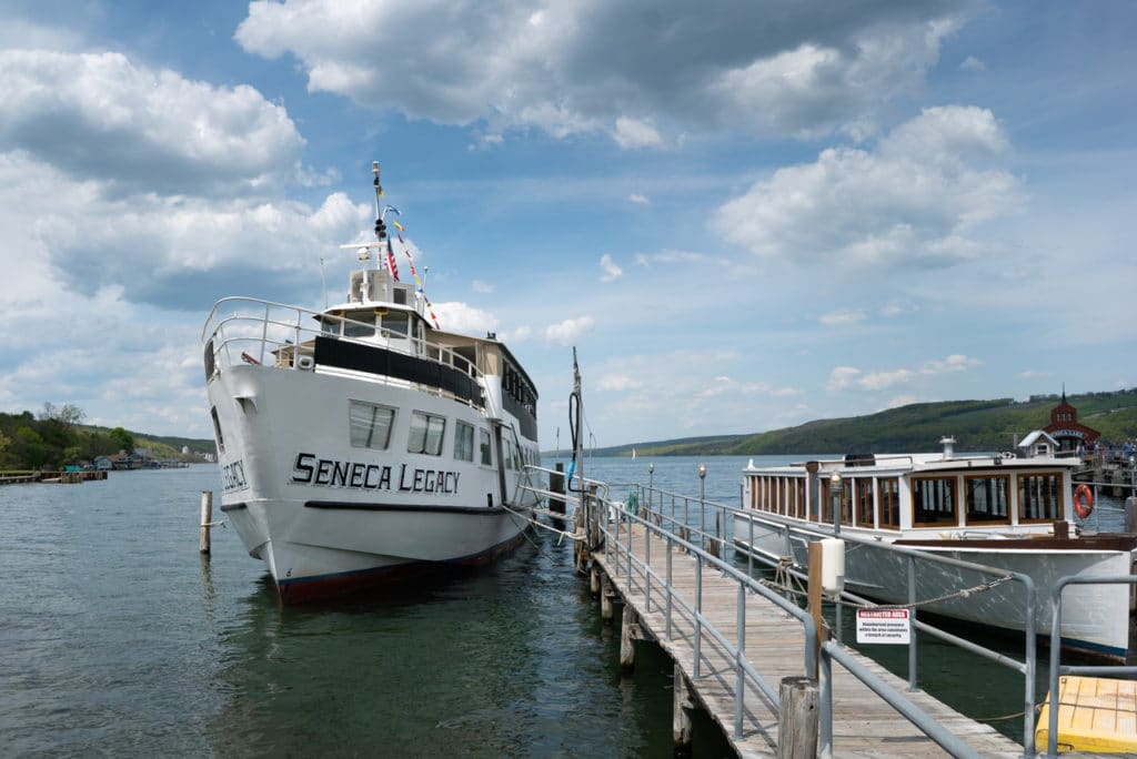 A tour boat named Seneca Legacy docked in the marina in Watkins Glen, NY.