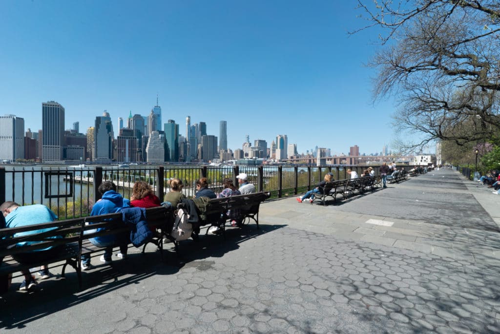 Brooklyn Heights Promenade with East River and Manhattan skyline view. 