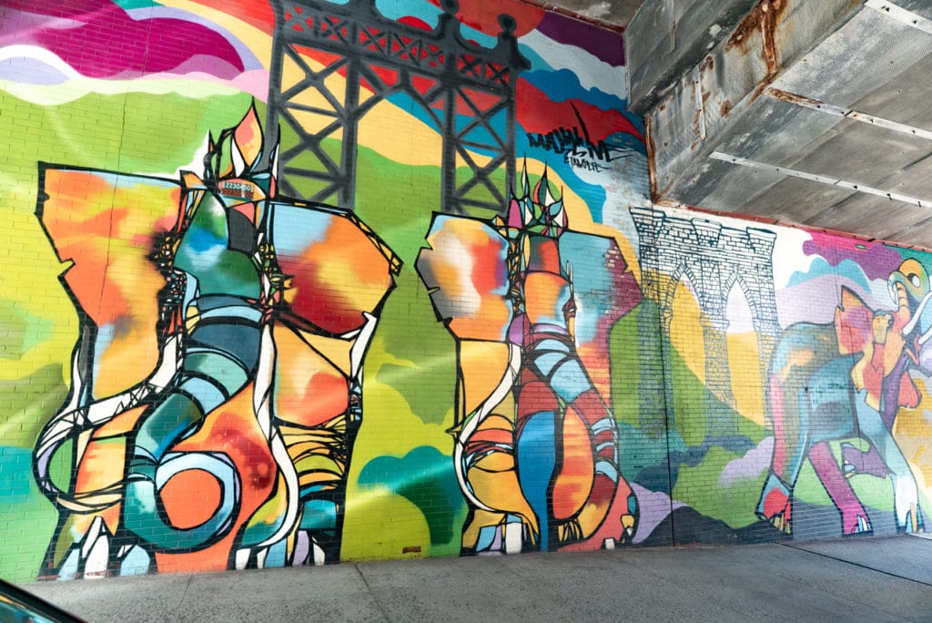 Large colorful outdoor mural of elephants in Dumbo, Brooklyn. 