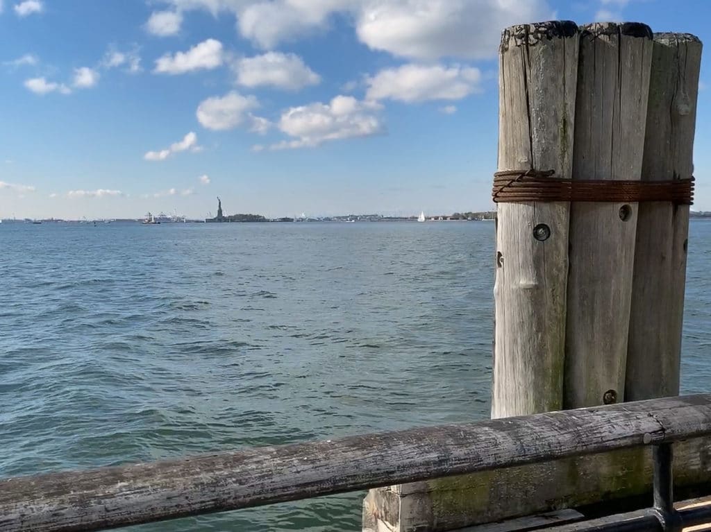 View of the Statue of Liberty from The Battery in New York City.