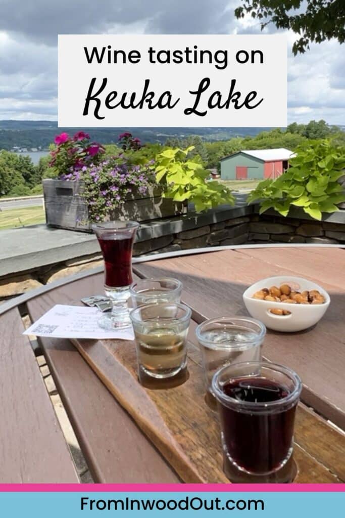 A wine flight on a table overlooking Keuka Lake in the Finger Lakes, NY.