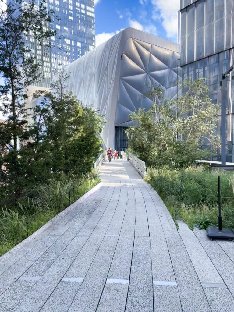 The High Line walkway leading to The Shed museum at Hudson Yards in New York City.