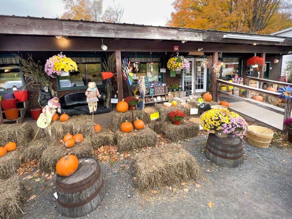 A general store decorated with hay bales and pumpkins for fall in Windham, NY. 