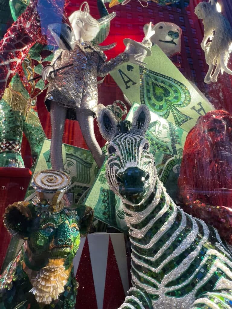 Jungle animal-themed Christmas holiday window display at Bergdorf-Goodman in New York City.