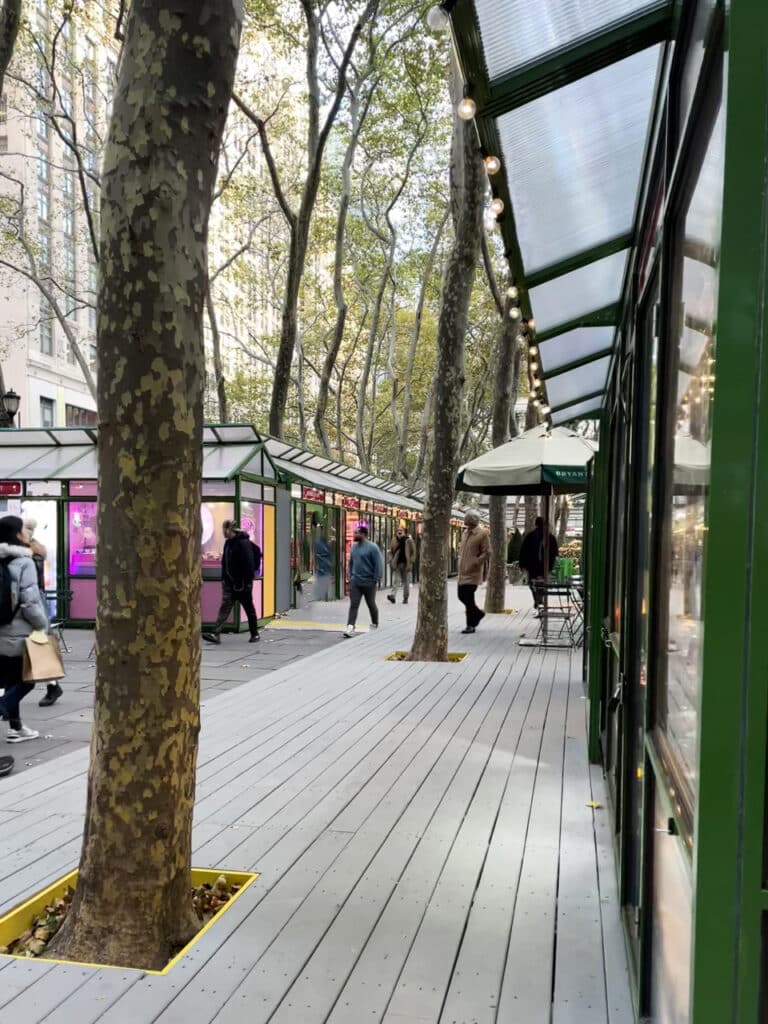 Row of holiday pop-up shops at Bryant Park Winter Village in New York City.