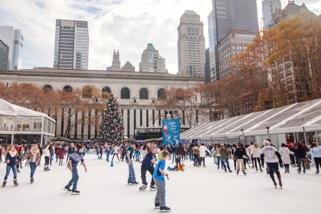 Ice skating during the day at Bryant Park in New York City.