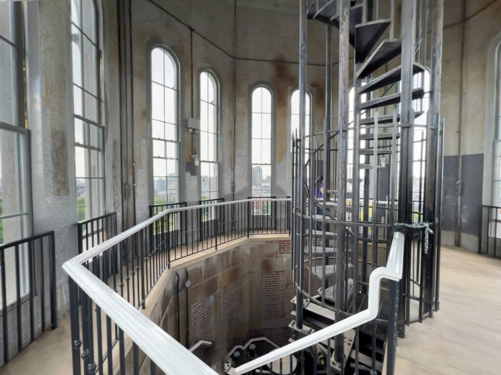 A narrow spiral staircase inside a water tower. 