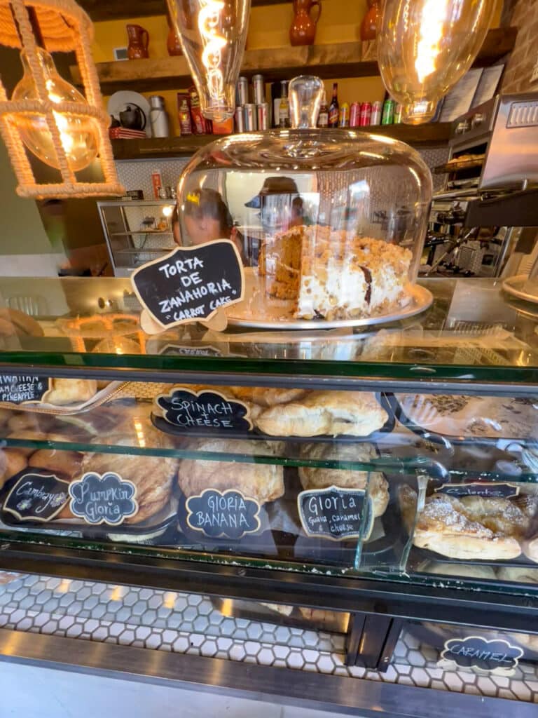 Pastries in a glass display case in a cafe. 