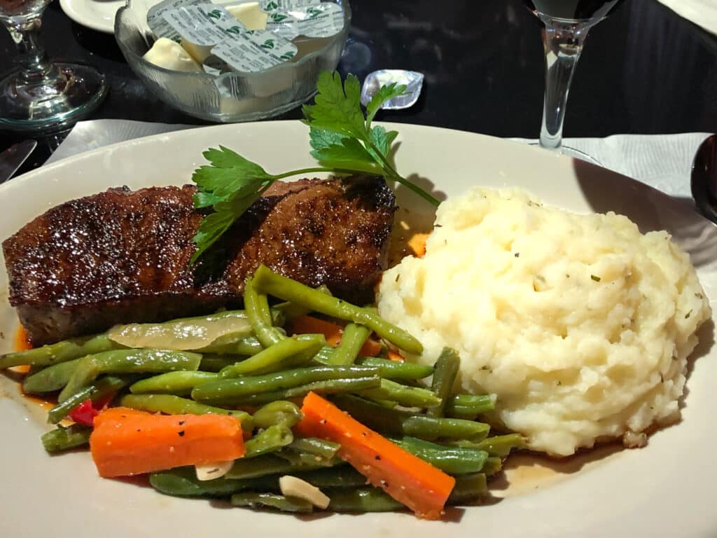 Steak, mashed potatoes, and mixed vegetables at Barstow House in Nichols, NY.