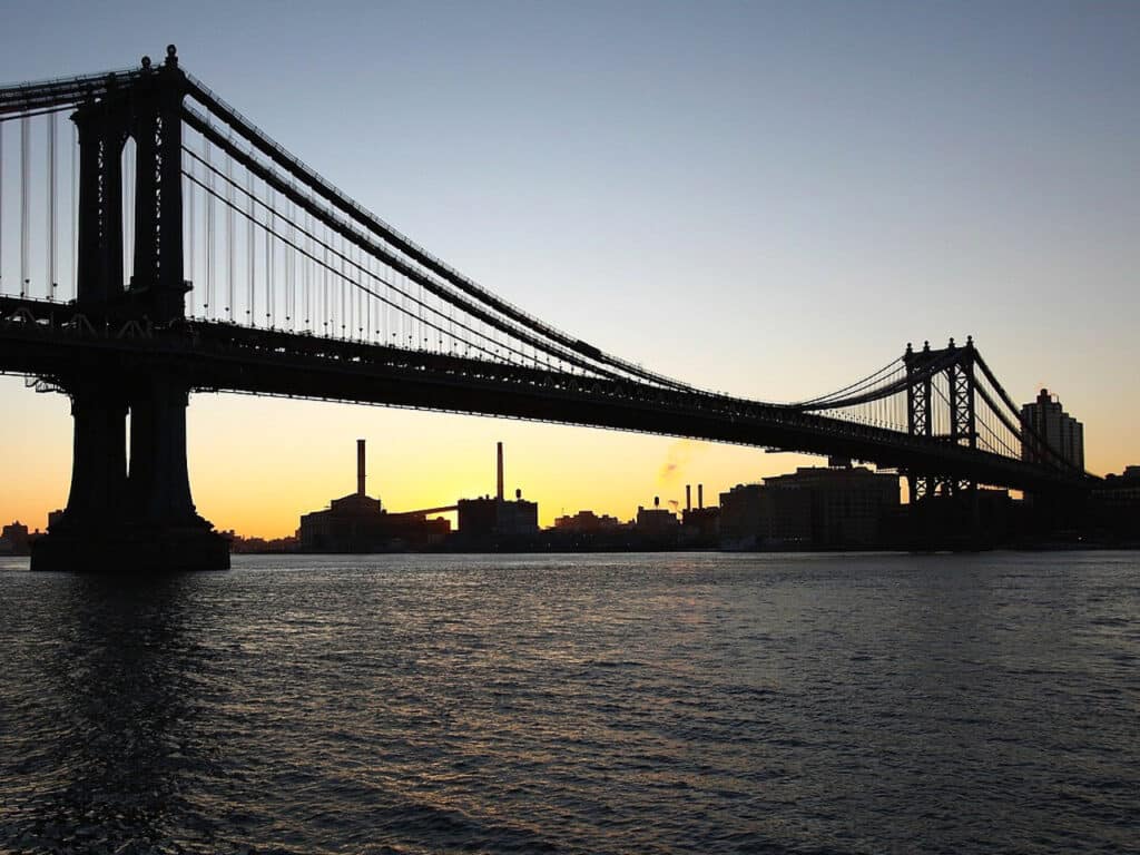 The Manhattan Bridge in New York City at sunset.