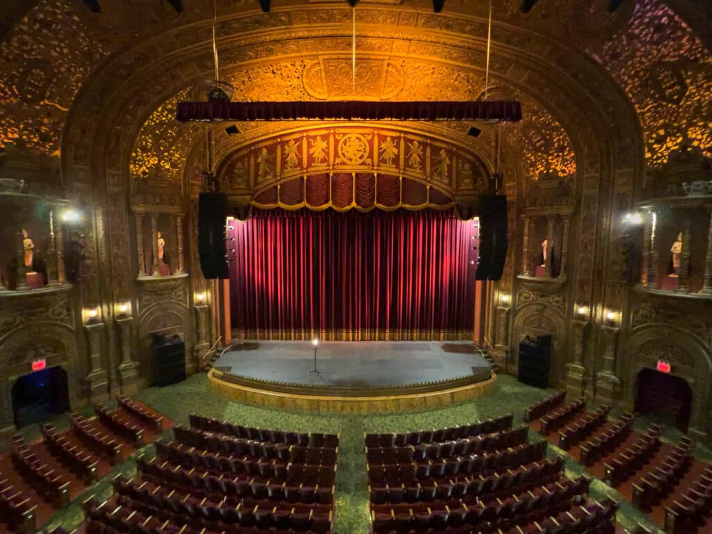 View of the stage and audience seating at United Palace theater in New York City.