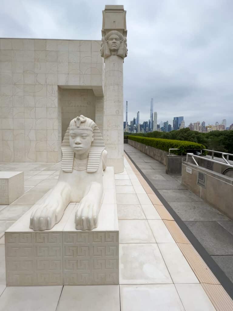 Large-scale art exhibit on the rooftop of the Metropolitan Museum of Art in New York City.