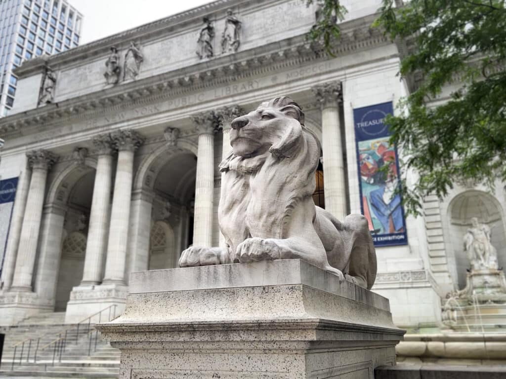 Marble lion in front of the New York Public Library Main Branch in New York City.