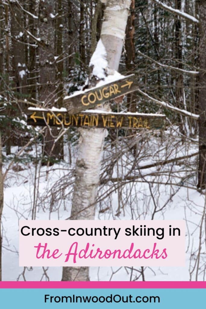 Pinterest graphic with an image of wooden signs posted to a tree indicating cross-country trail names and directions.